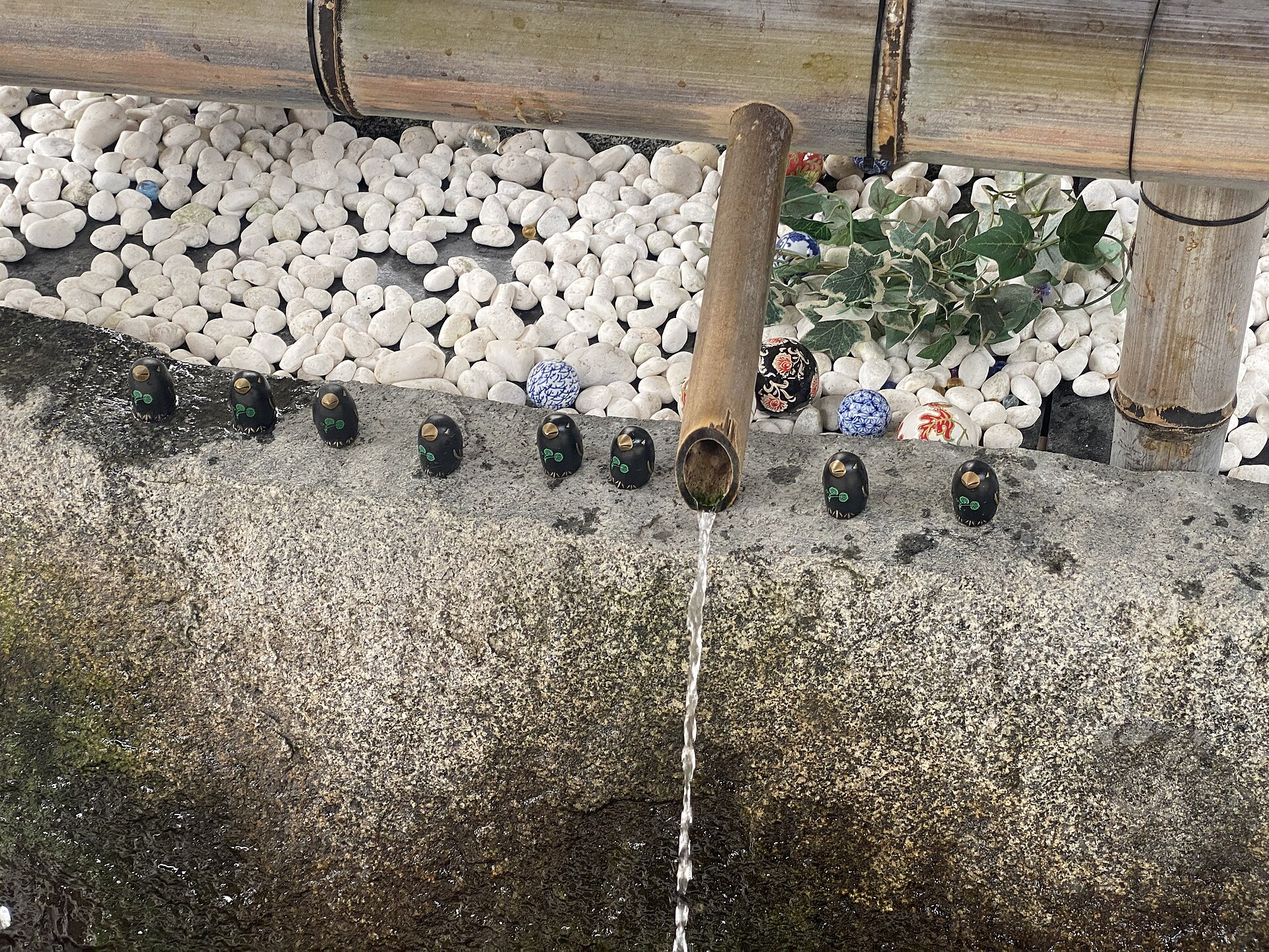 The wide gravel approach and sand cones at Kamigamo Shrine in Kyoto