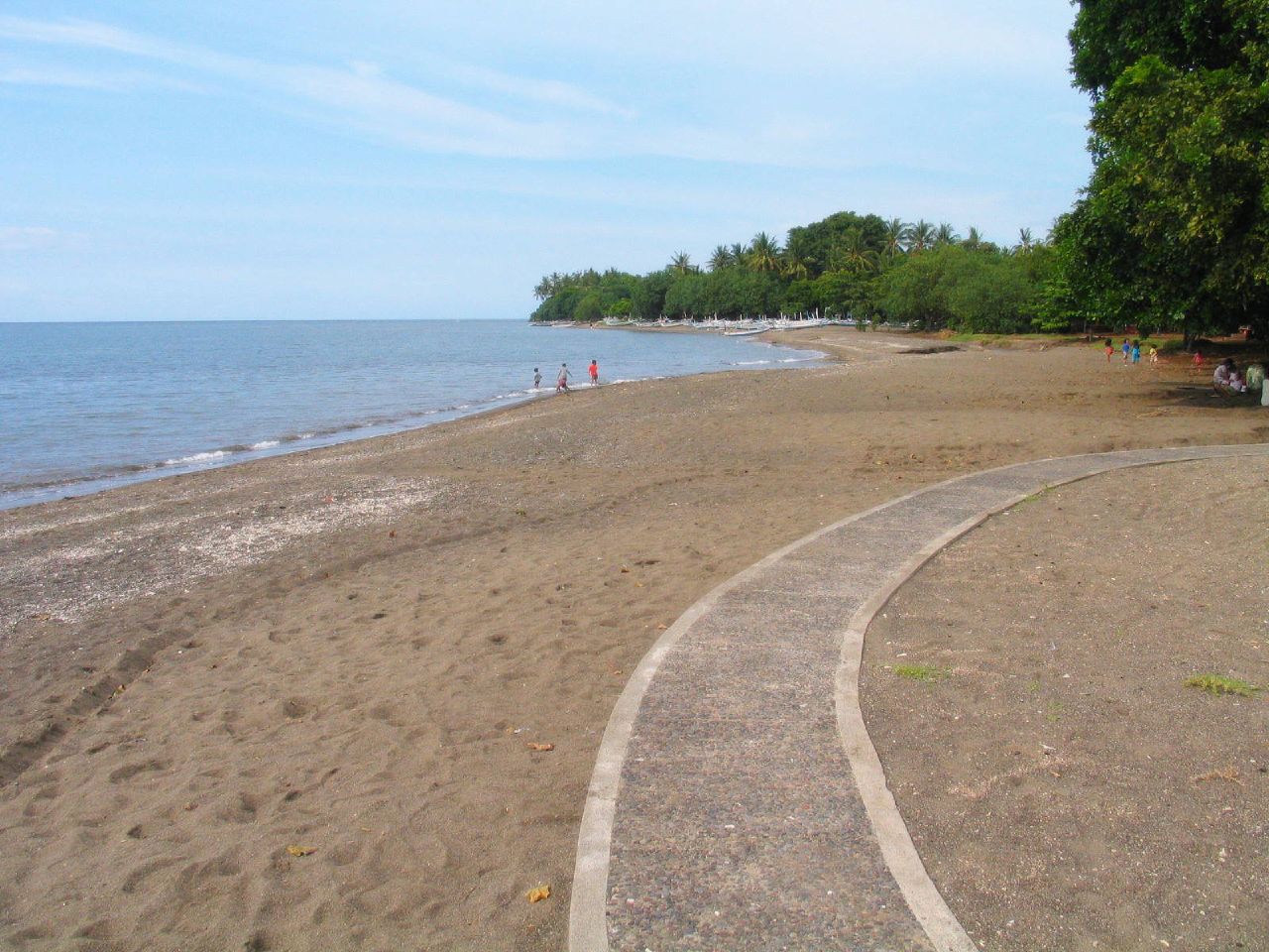 The black-sand shore at Lovina on the north coast of Bali